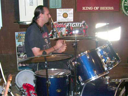 Mick, Rich
                                                        and Charley play
                                                        the blues at
                                                        Open Mic at Big
                                                        Johns Pub