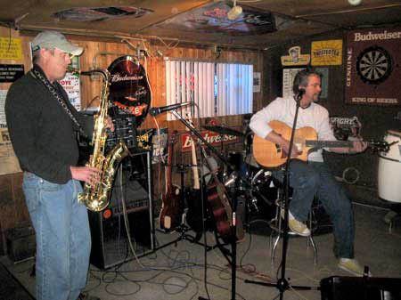 Burnt
                                                        Meadow Boys'
                                                        Matt Byrne plays
                                                        sax with One Bad
                                                        Otter Tim Zusin